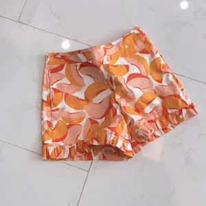 Women's Peach Orange Printed Ruffle Hem Shorts